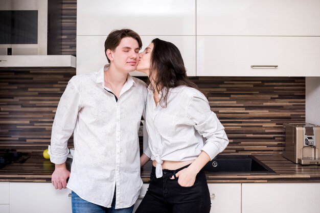 Modern couple in kitchen