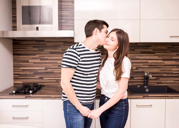 Modern couple in kitchen