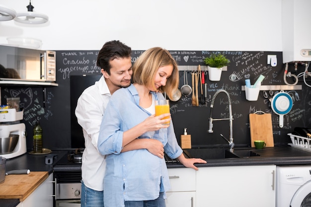 Modern couple in kitchen