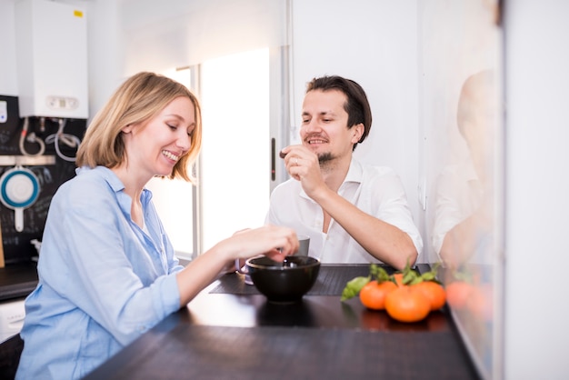 Modern couple in kitchen