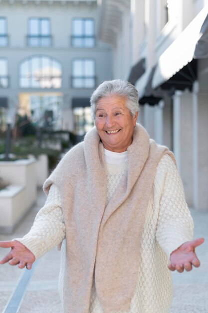 Modern elderly woman living in the city