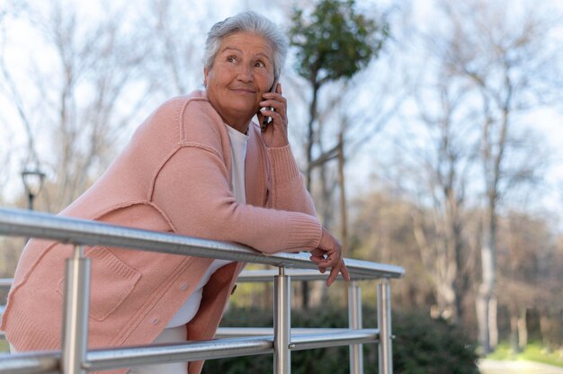 Modern elderly woman living in the city