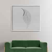 Free photo modern living room interior design with leaf photo frame hanging on a wall