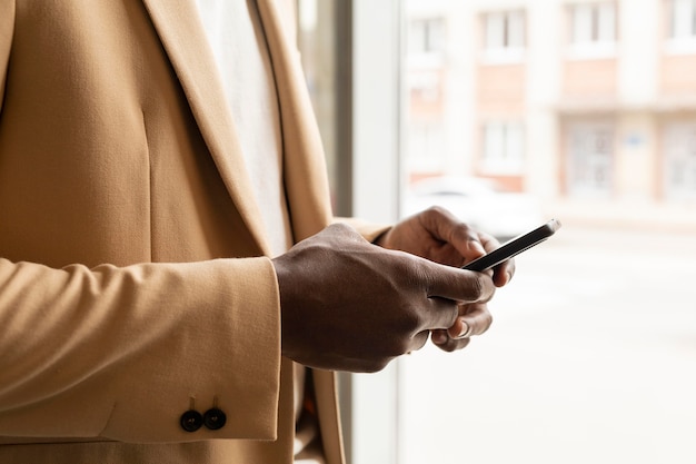 Modern man in beige suit