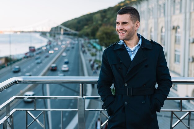 Free photo modern man on bridge