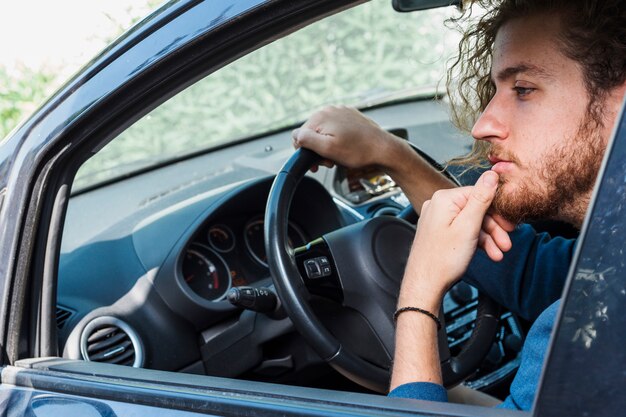 Modern man in car