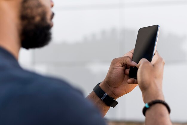 Modern man checking his phone