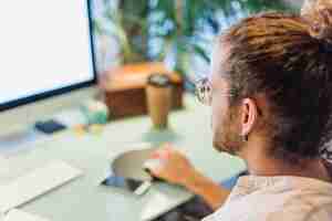 Free photo modern man at desk