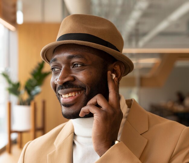 Modern man doing business in a caffe