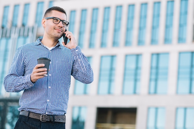 Modern man making phone call