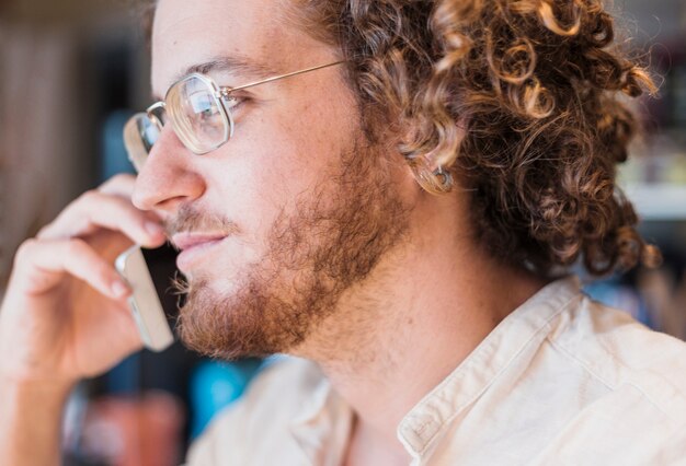 Modern man making phone call