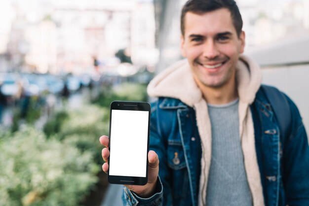 Modern man presenting smartphone template