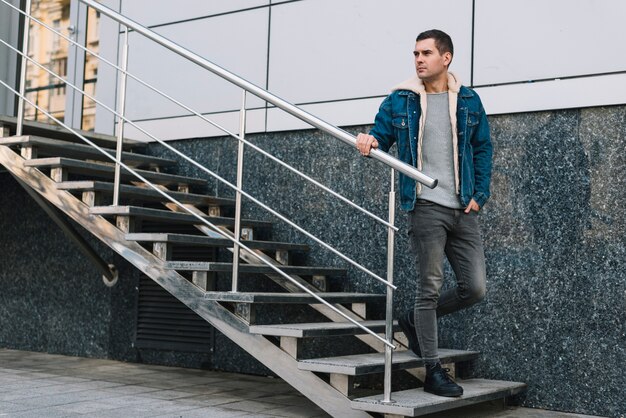 Modern man on stairs