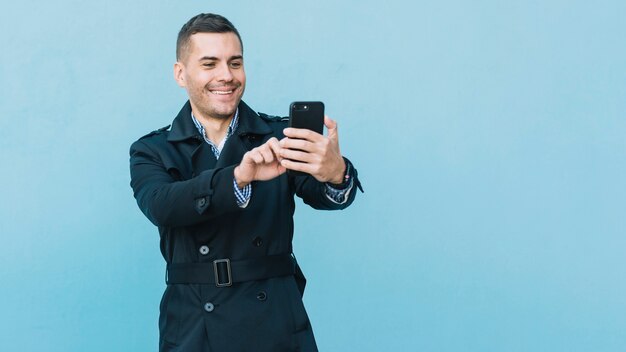 Modern man taking selfie