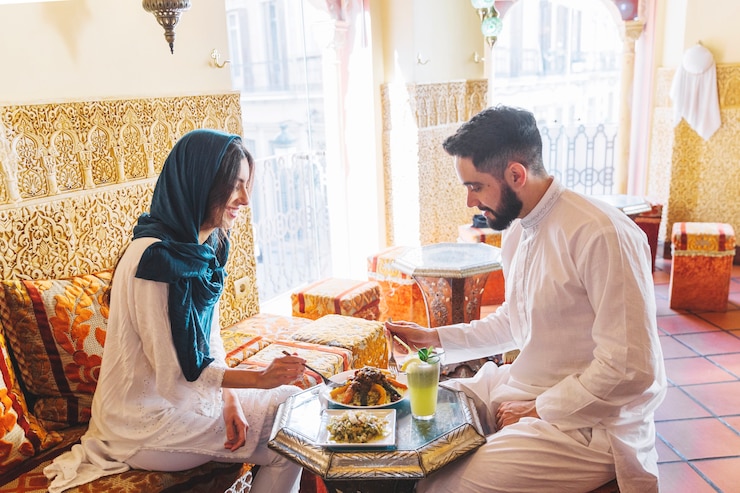 Free Photo modern muslim couple in arab restaurant