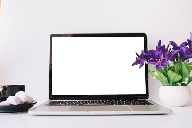 Modern office desk composition with technological device