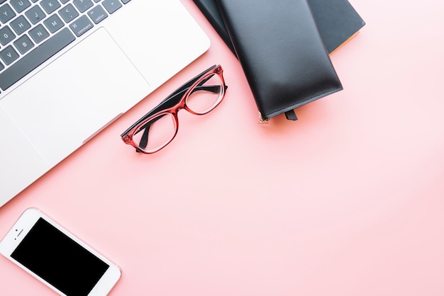 Modern office desk composition with technological device