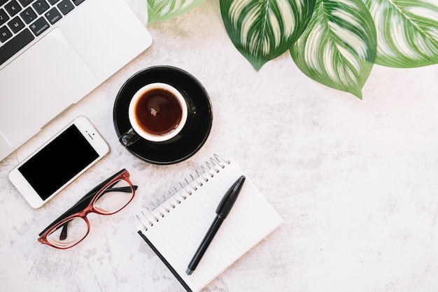 Modern office desk composition with technological device