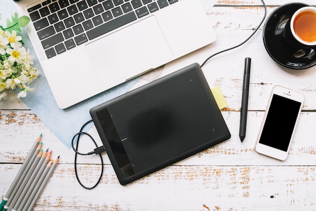 Modern office desk composition with technological device