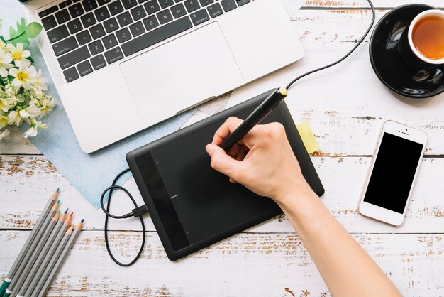 Modern office desk composition with technological device