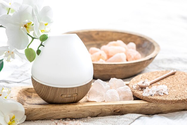 Modern oil aroma diffuser close up on a blurred background