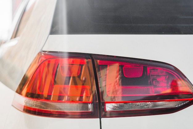 Modern rear light on white auto