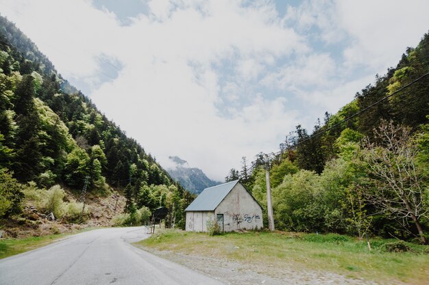 Modern road surrounded by mountains