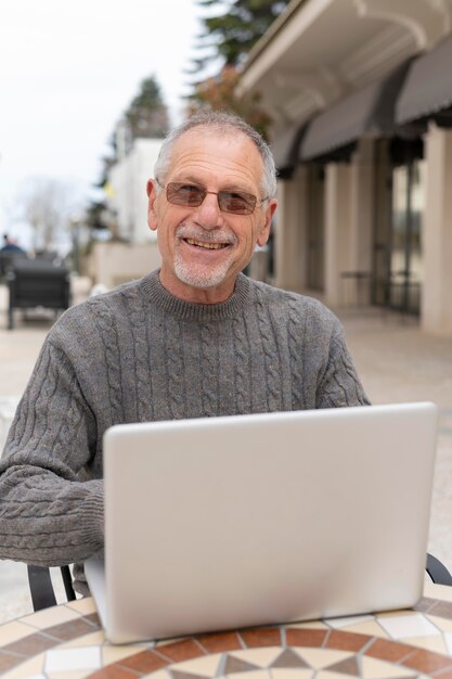 Modern senior man living in the city