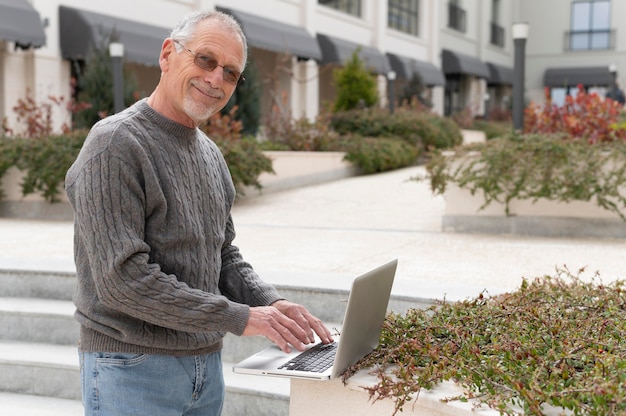 Modern senior man living in the city