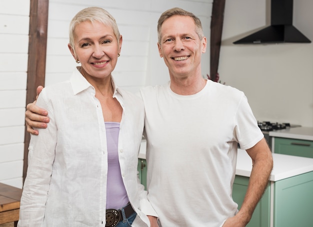 Free photo modern senior smiley couple posing