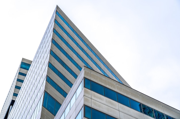 Modern skyscraper with many windows during daytime