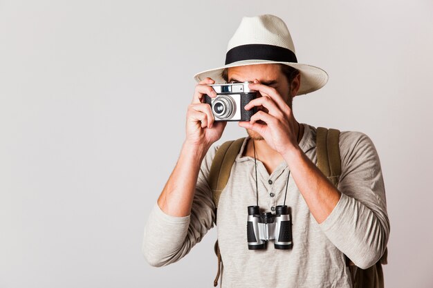 Modern tourist using camera