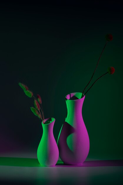Modern vases with green and pink light