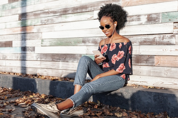 Modern woman looking on her phone