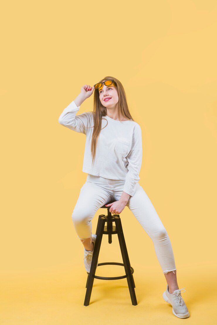 Free Photo modern woman on stool