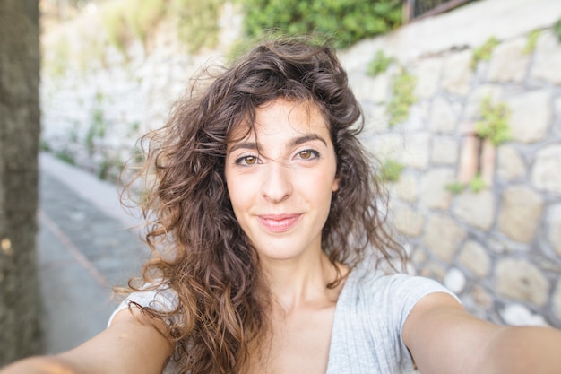 Modern woman taking a selfie