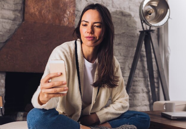 Modern woman taking a selfie