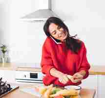 Free photo modern woman talking on phone