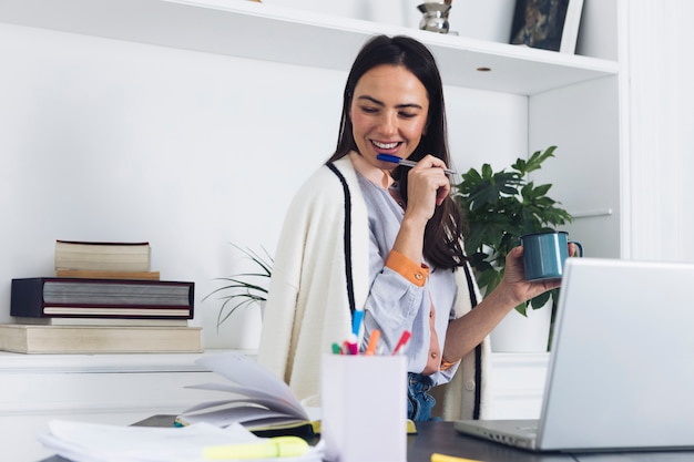 Modern woman using laptop