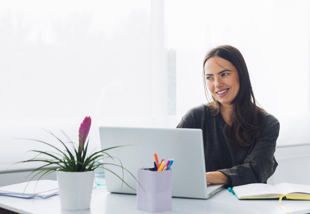 Modern woman using laptop