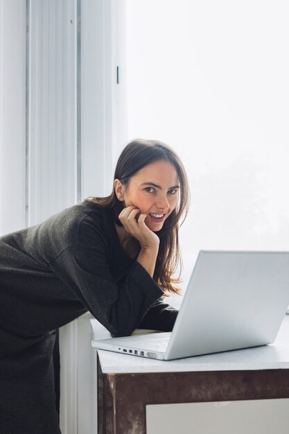 Modern woman using laptop