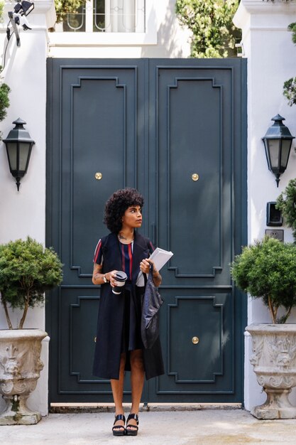 Modern woman walking on the street