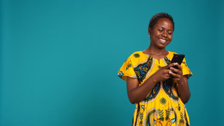 Free Photo modern young woman browses online websites on her phone