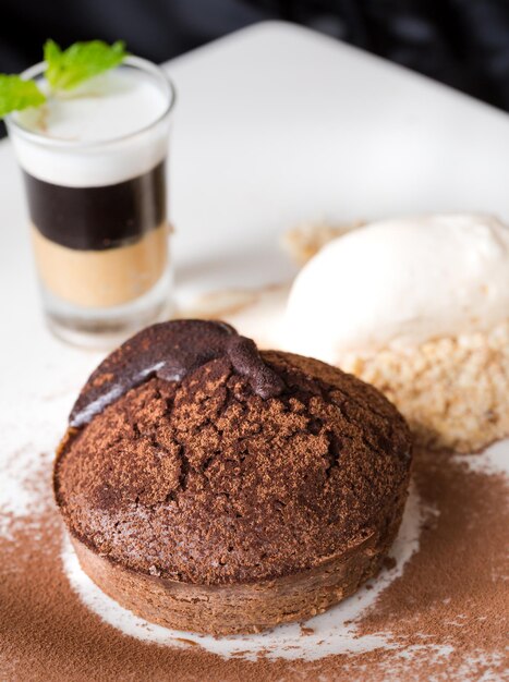 Molten chocolate cake with peanut butter shooter.