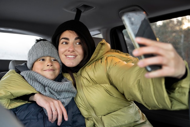 Mom and child in car while traveling