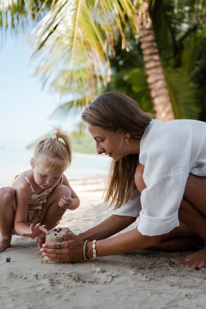 Mom and daughter enjoying their sunny holiday