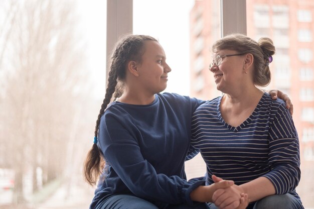 Mom and daughter at home