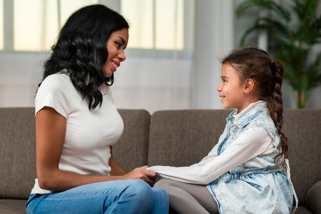 Mom and daughter looking at each other