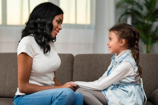 Mom and daughter looking at each other