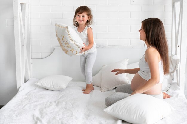 Mom and daughter playing together